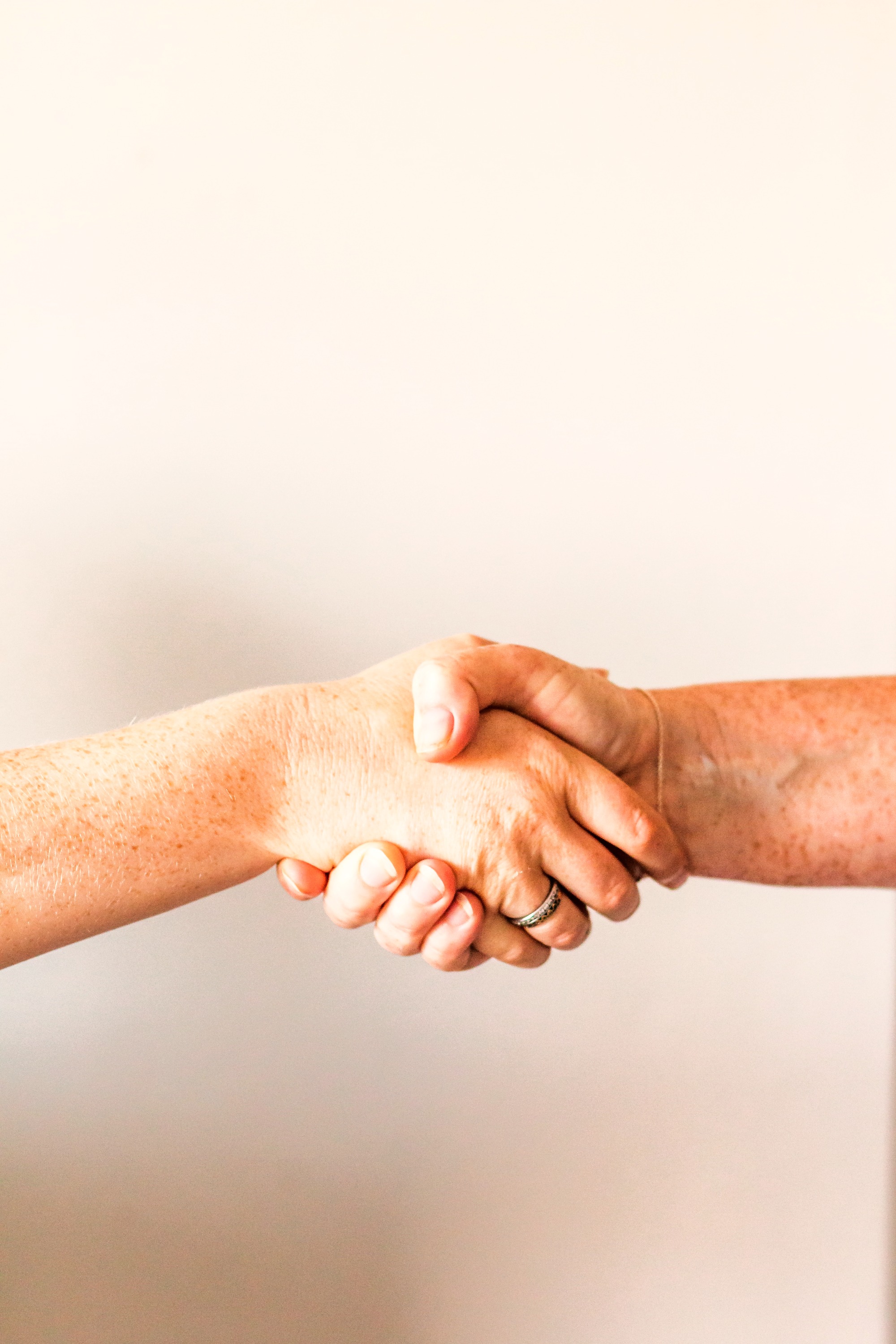 Handshake representing stakeholder coordination